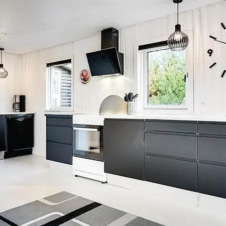 Three-bedroom In Henne Сasa de vacaciones